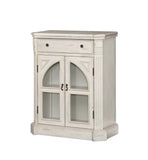 One Drawer Two Door Cabinet Cabinet Hand Painted White Rub Finish 1 Drawer with Extended Drawer Glides 2 Cathedral Glass Paneled Doors 1 Interior Fixed Shelf Canted Corners with Fluting Adjustable Levelers